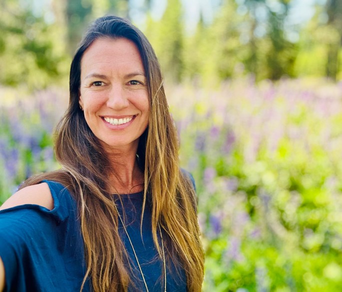 Jenni Buczko Jenni B This is a picture of Jenni with a backdrop of wild flowers - lupins